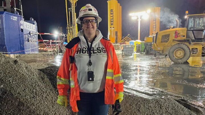 Leah-Ann standing on a work site in her safety equipment.